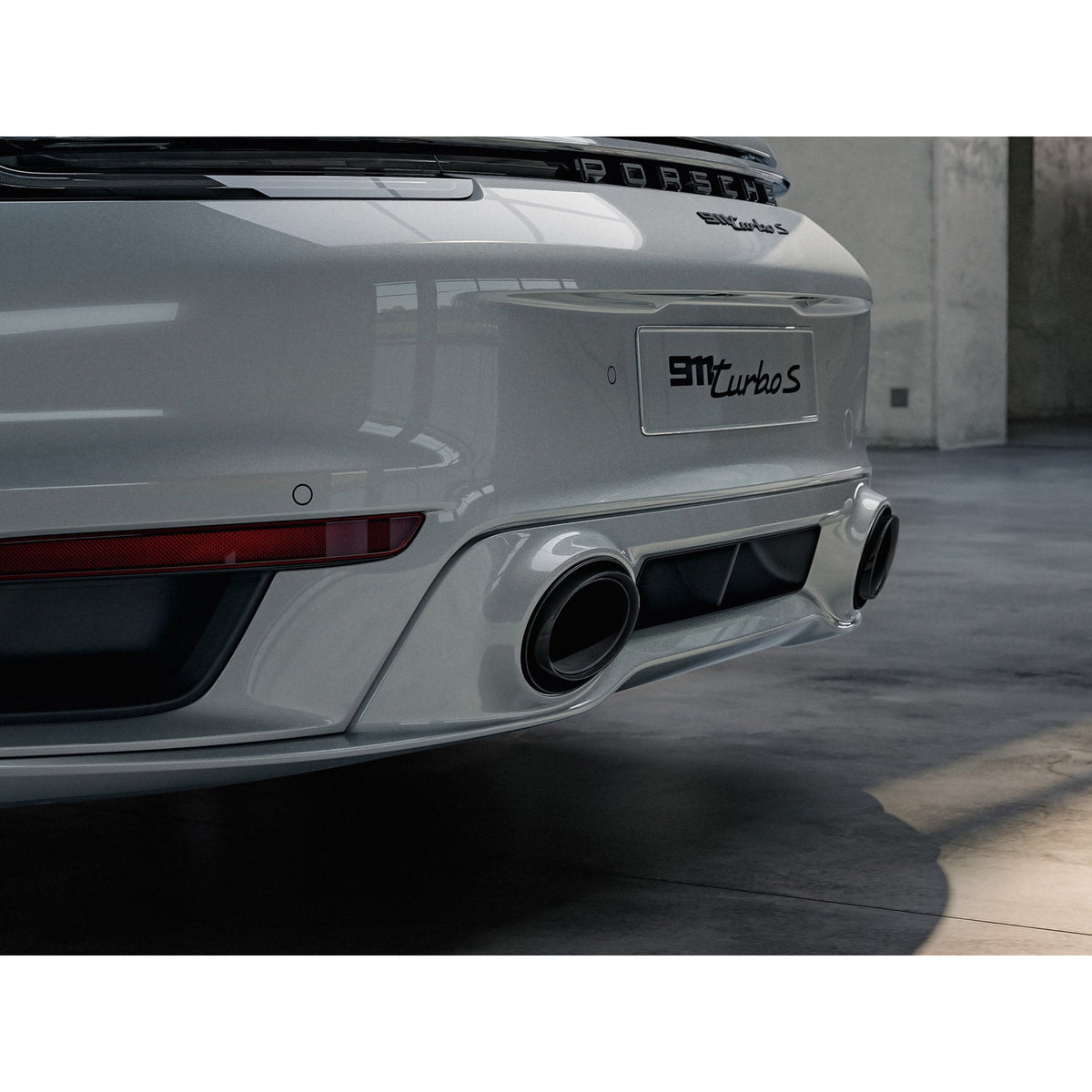 Endrohre in Schwarz der Sportauspuffanlage Porsche 992 – Originalteil